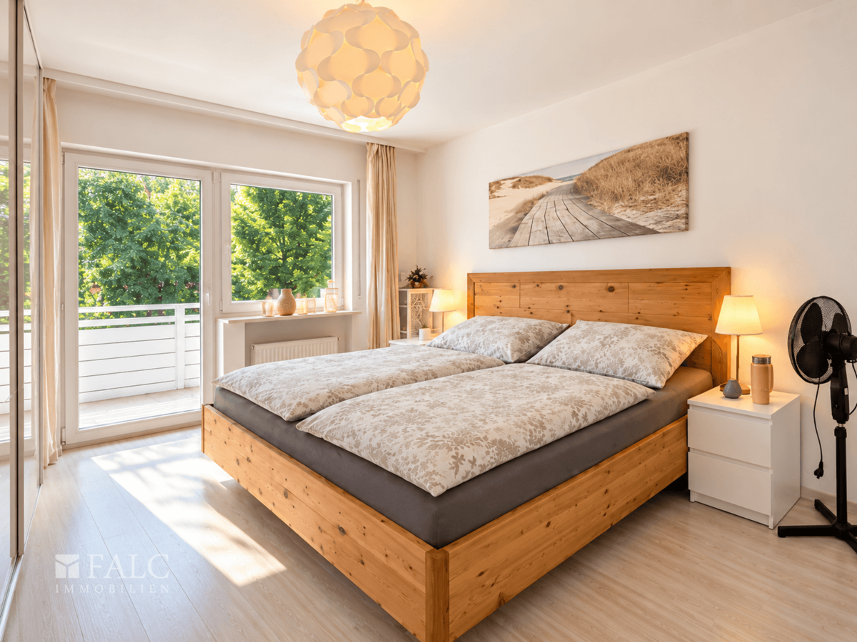 Schlafzimmer mit Balkonblick