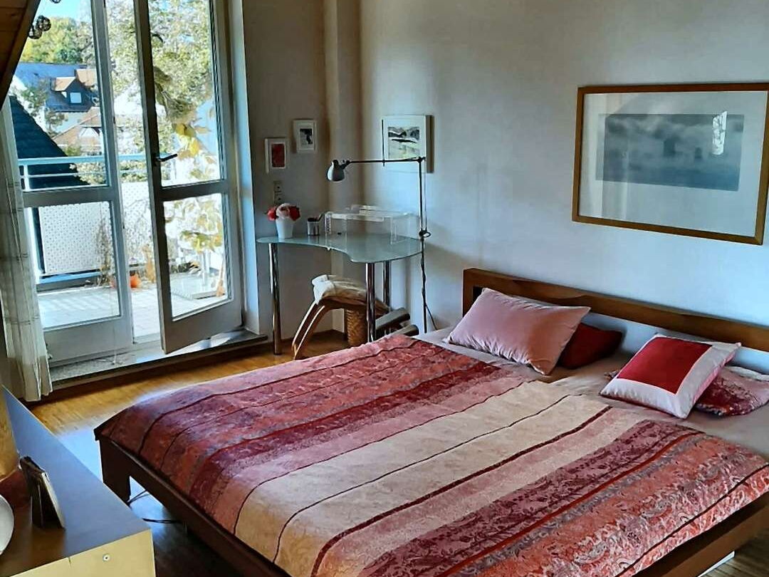 Schlafzimmer mit Balkonzugang