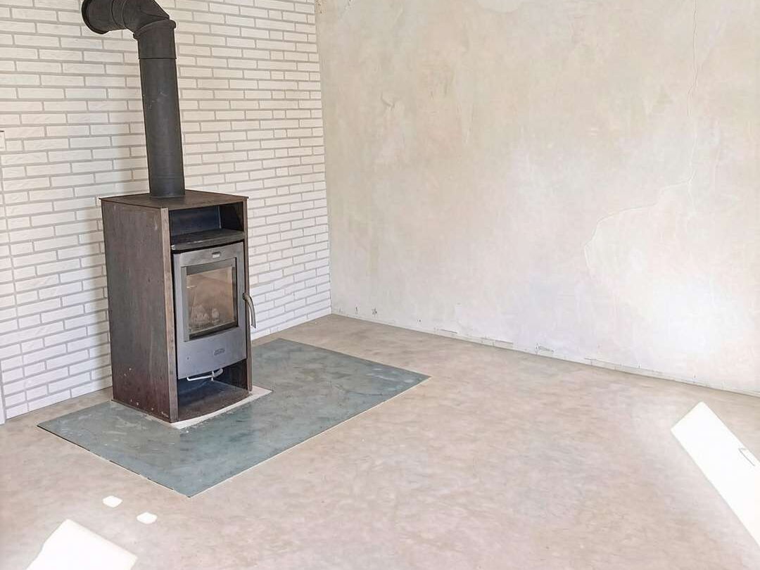 Wohnzimmer mit Kamin