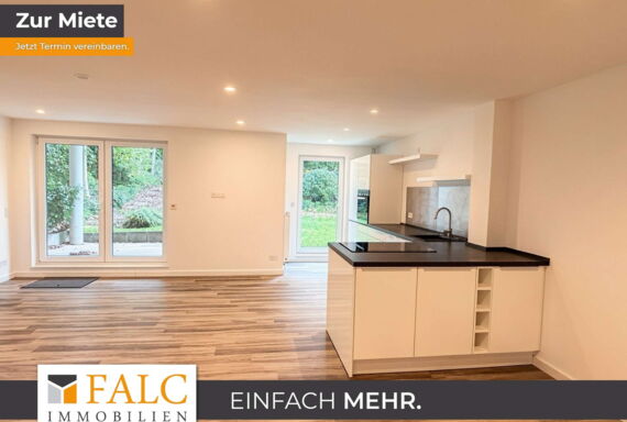 Wohnzimmer mit Einbauküche
