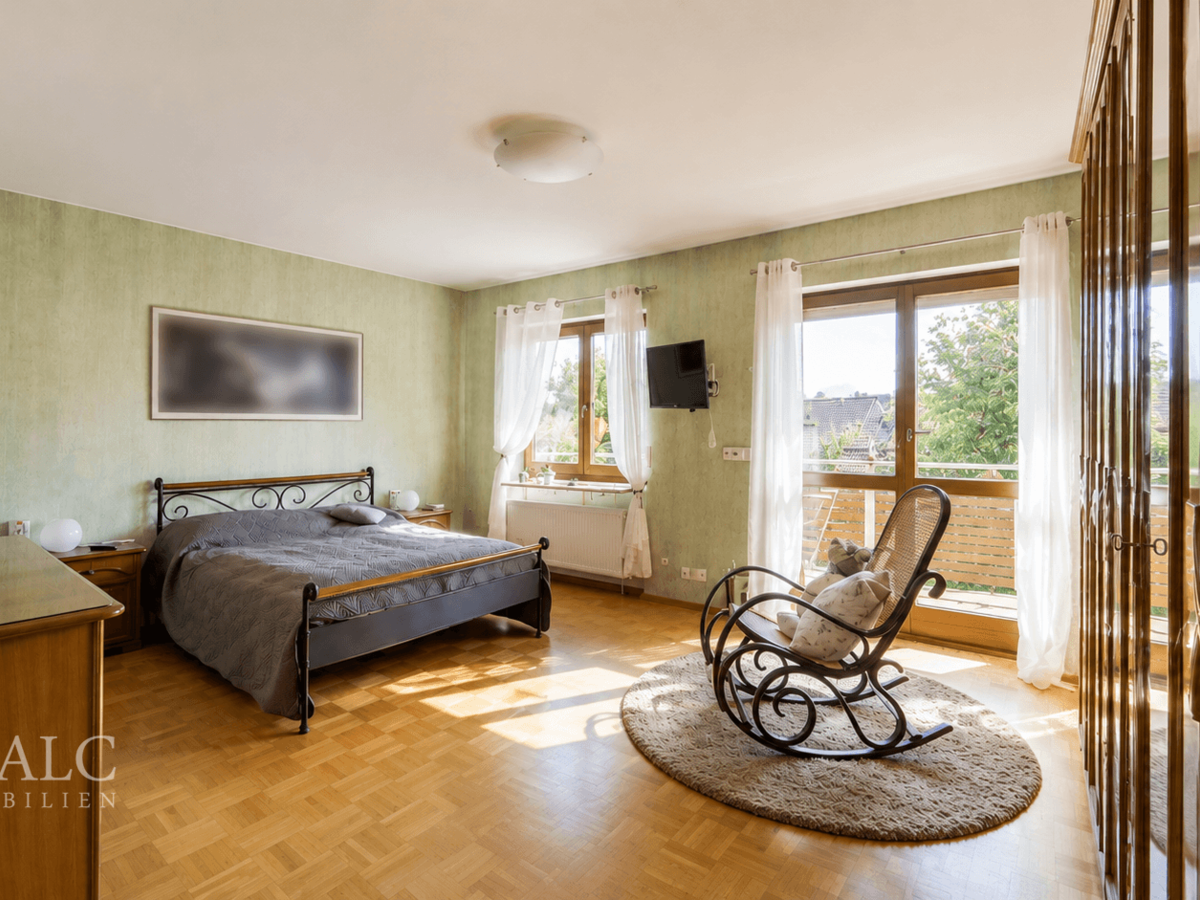 Schlafzimmer mit Balkon
