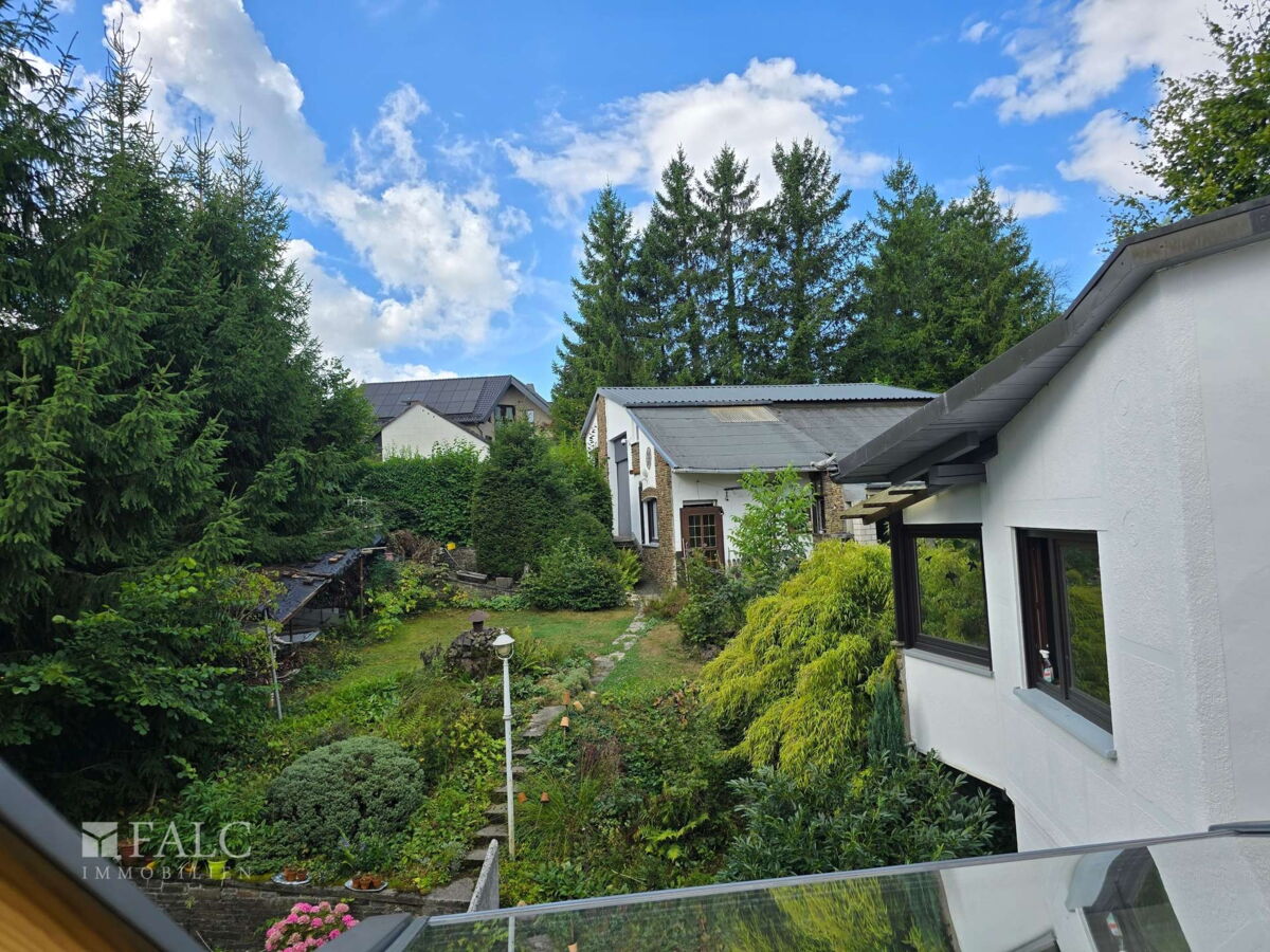 Gartenansicht Haupthaus zur Garage